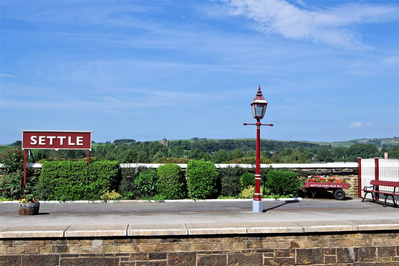 The Settle-Carlisle railway crossing a stone viaduct in the Yorkshire Dales.